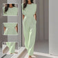 Egyszínű, széles szárú jumpsuit