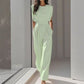 Egyszínű, széles szárú jumpsuit