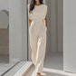Egyszínű, széles szárú jumpsuit
