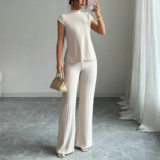 👗🌸 Elegáns magas nyakú felső és széles szárú nadrág 2 részes szett – bordázott textúra, folyó sziluett és sokoldalú stílus ✨