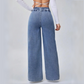 👖 MOST 30%-OS KEDVEZMÉNY! ✨ Magas derekú, széles szárú farmer – Aszimmetrikus részlet, rugalmas derékrész & vintage mosás – Előnyös és könnyedén elegáns 🧵