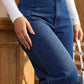 👖 MOST 30%-OS KEDVEZMÉNY! ✨ Magas derekú, széles szárú farmer – Aszimmetrikus részlet, rugalmas derékrész & vintage mosás – Előnyös és könnyedén elegáns 🧵